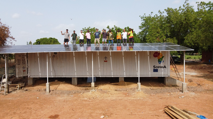 Figure: 1 The SophiA system and the installation team
